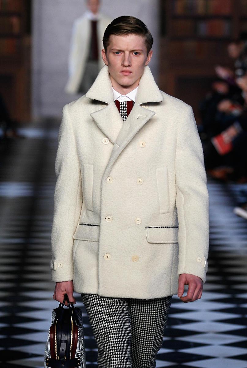 new york, ny - february 08:  a model walks the runway at tommy h