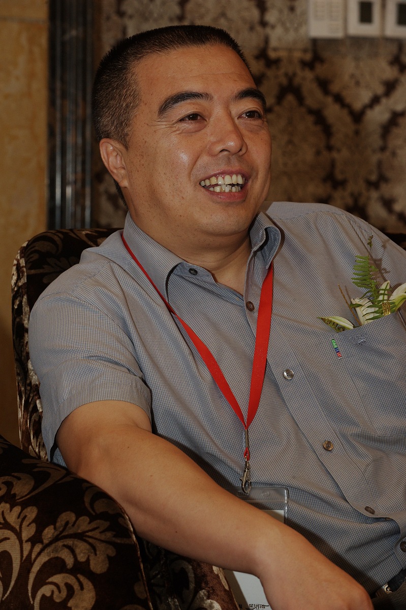 ***_***2011年7月3日,在上海举办的中国经营论坛上,光明乳业总裁郭本