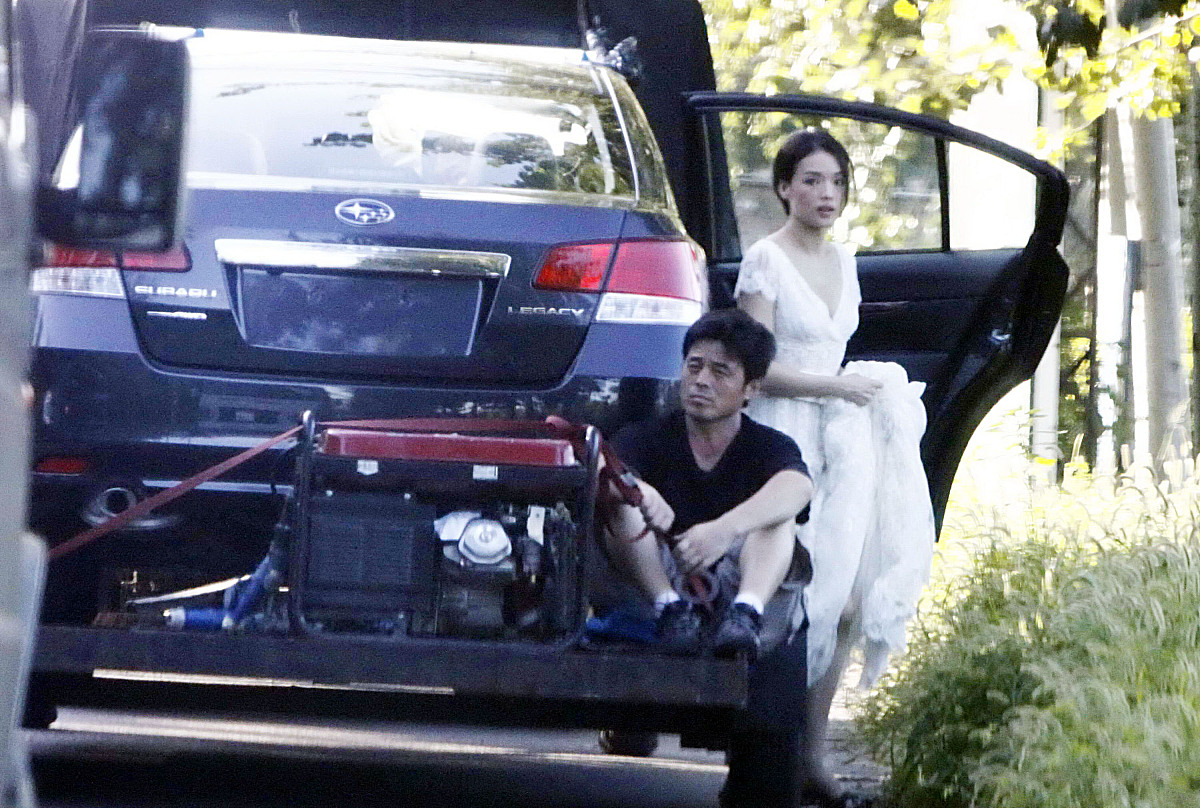 2009年8月11日,北京,舒淇拍摄某汽车广告.***_***+++_+++女星,拍广告,