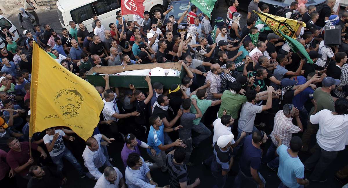 palestinian friends and relatives of palestinian teenager mohamm