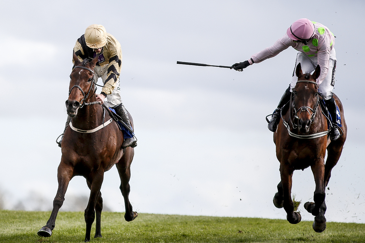 naas, ireland - april 25:   david mullins riding bellshill (l) w