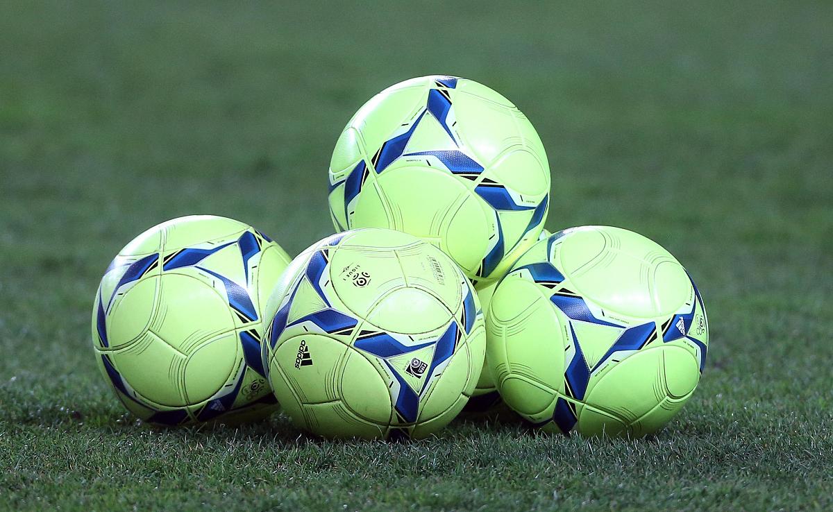 saint-etienne, france - march 17: balls lay on the ground during
