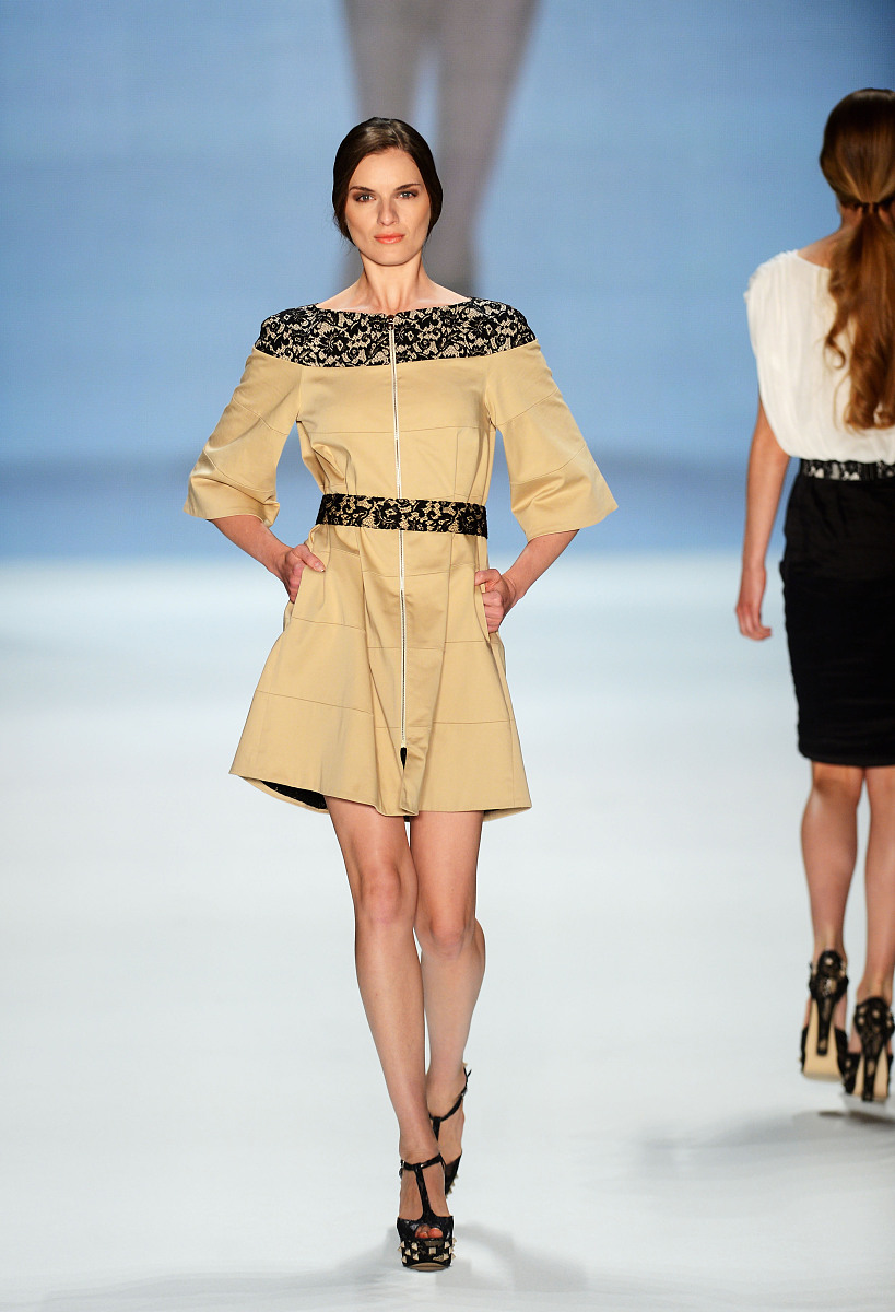 berlin, germany - july 07:  a model runs the catwalk during the 