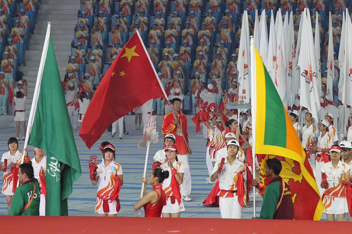 以迎亚运庆七一主题写一篇文章