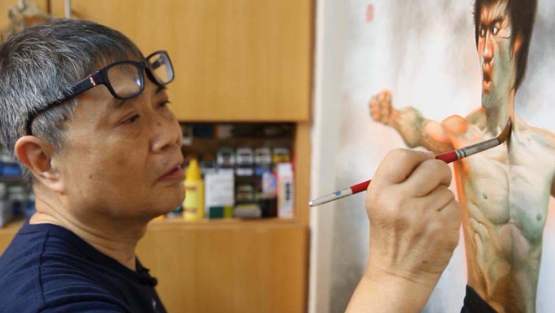 李小龙肌肉有多发达?他的海报师只用了一个词,粉丝直接服气