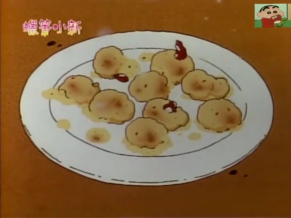 野原家的章鱼小丸子,倒上面糊和章鱼腿后,撒上柴鱼片更美味哦!