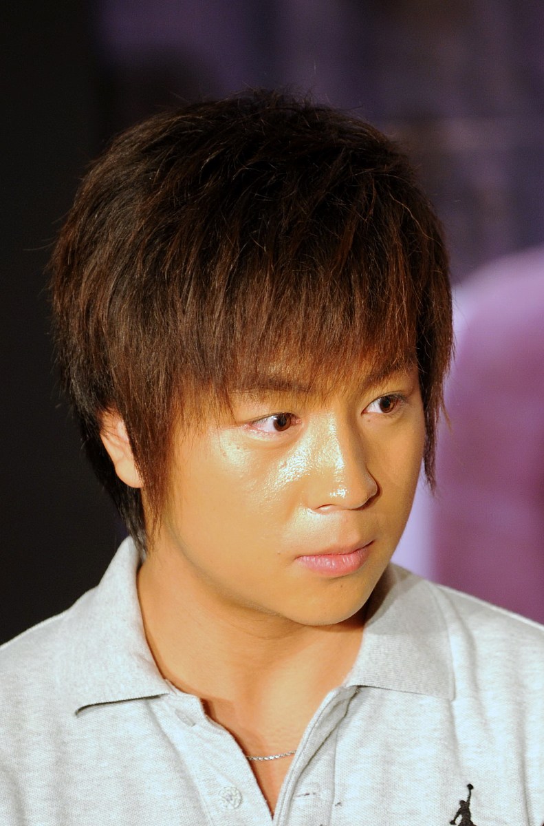 2009年7月2日,北京,系列电影《火线追凶》官网开通仪式.***_***释小龙