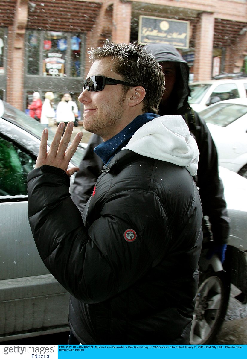 park city, ut - january 21:  musician lance bass walks on main s