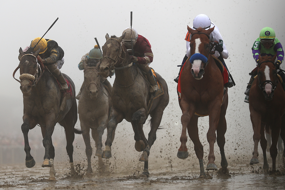 baltimore, md - may 19: justify #7 ridden by jockey mike smith w