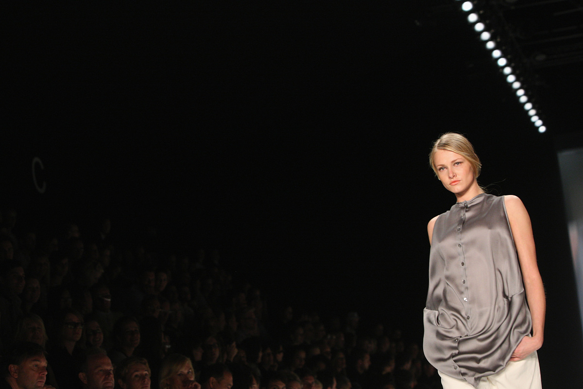 berlin, germany - july 07:  a model runs the catwalk during the 