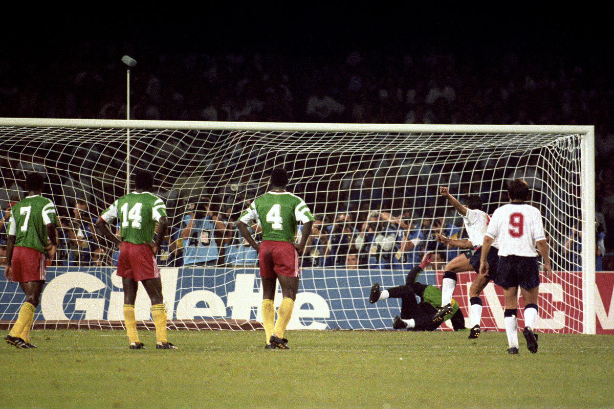 england's gary lineker (second r) smashes the ball past cameroon