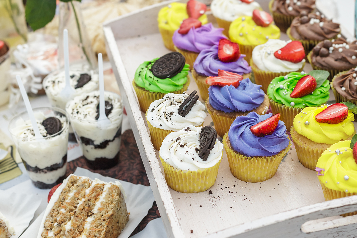 colorful cupcakes and dessert with oreo cookies