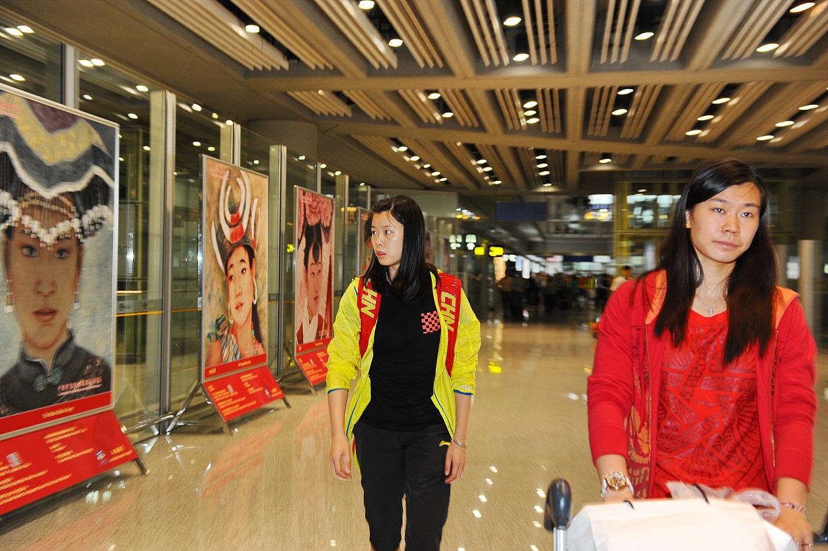 2013年5月27日,北京,中国羽毛球队凯旋,携五连冠返回略显疲惫.***_***