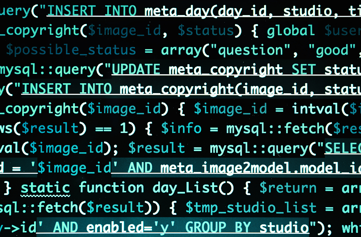script code on monitor, closeup. software development concept