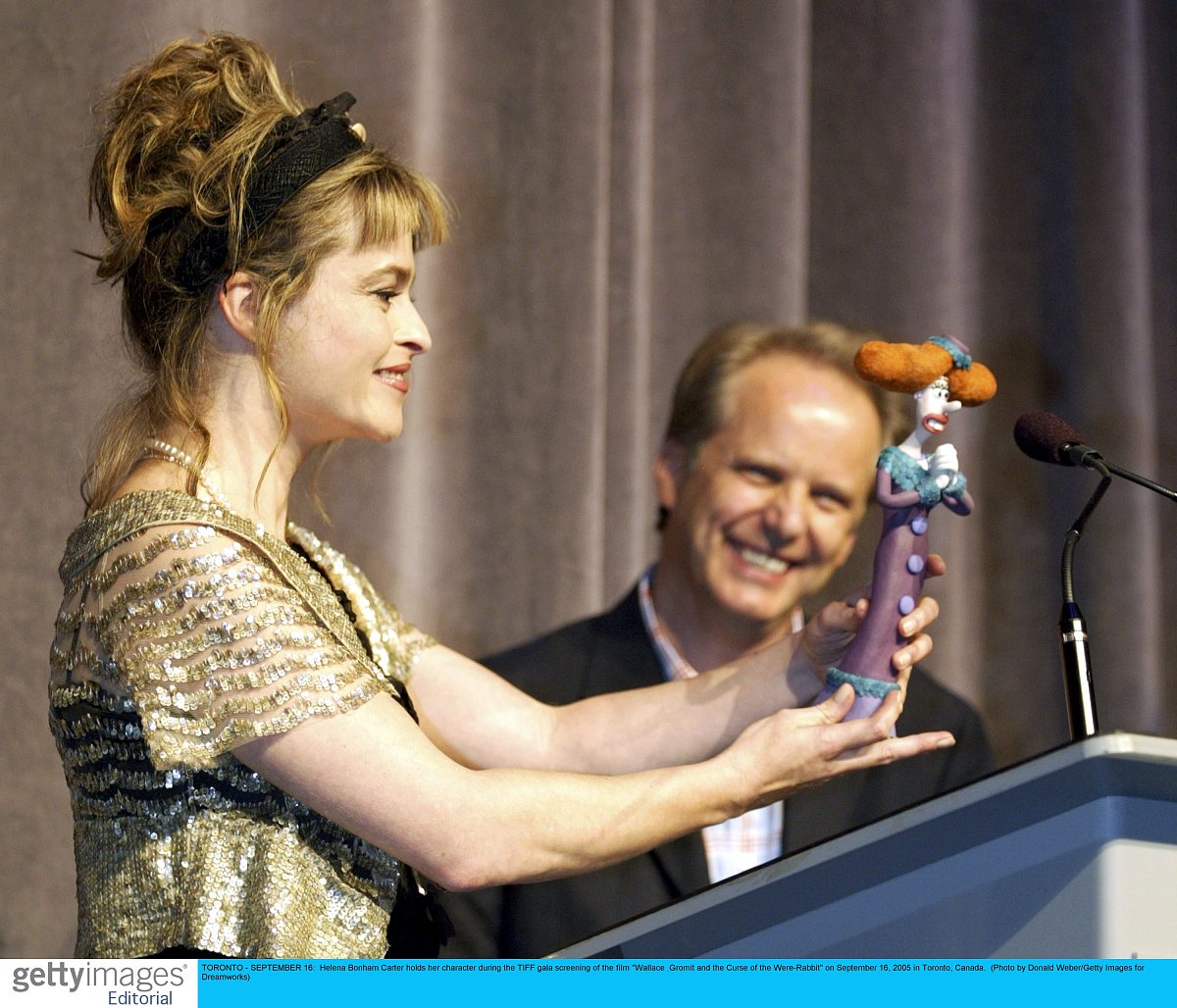 toronto - september 16:  helena bonham carter holds her characte