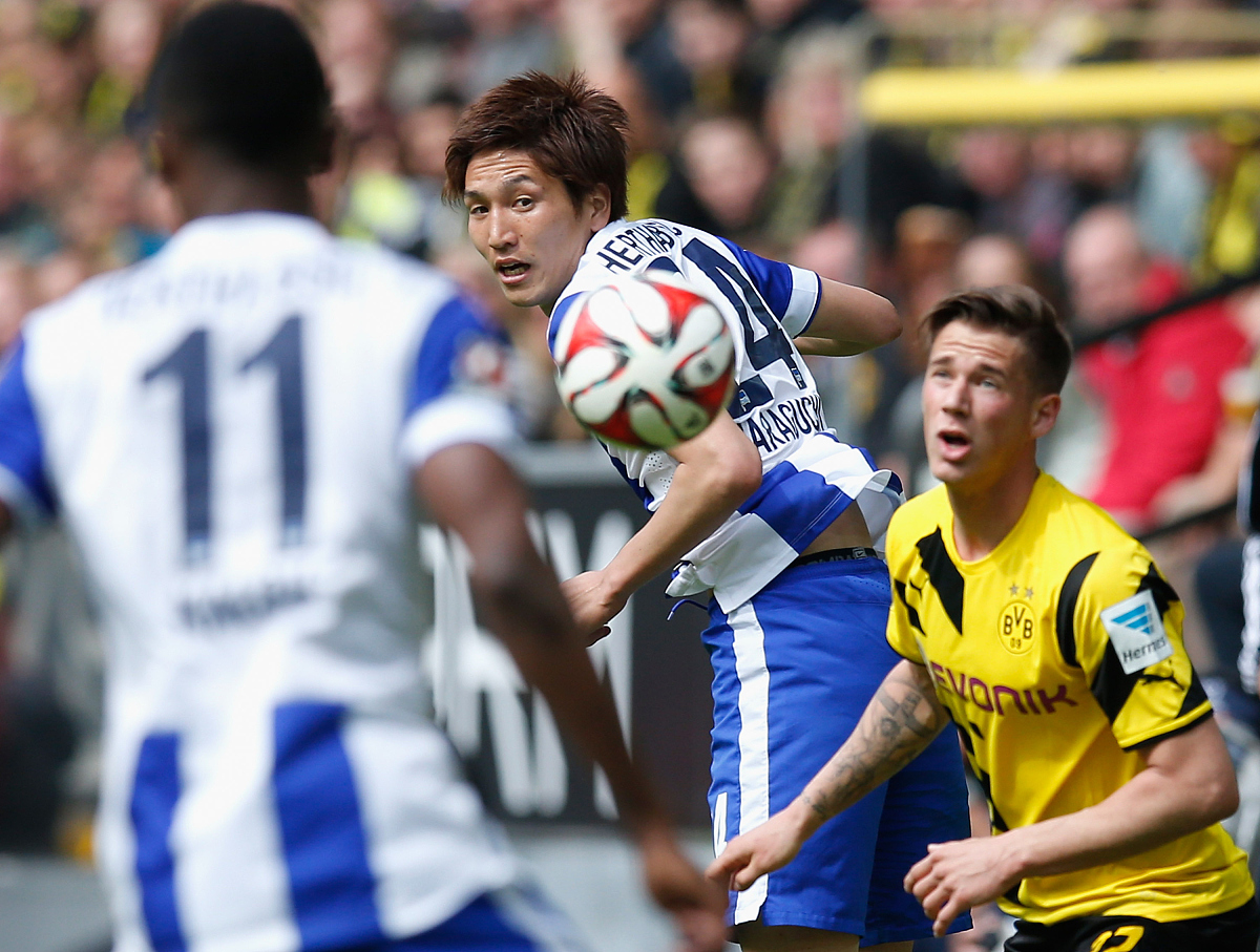 dortmund, germany - may 09:  genki haragu<strong>c</strong>hi (c) of berlin jumps