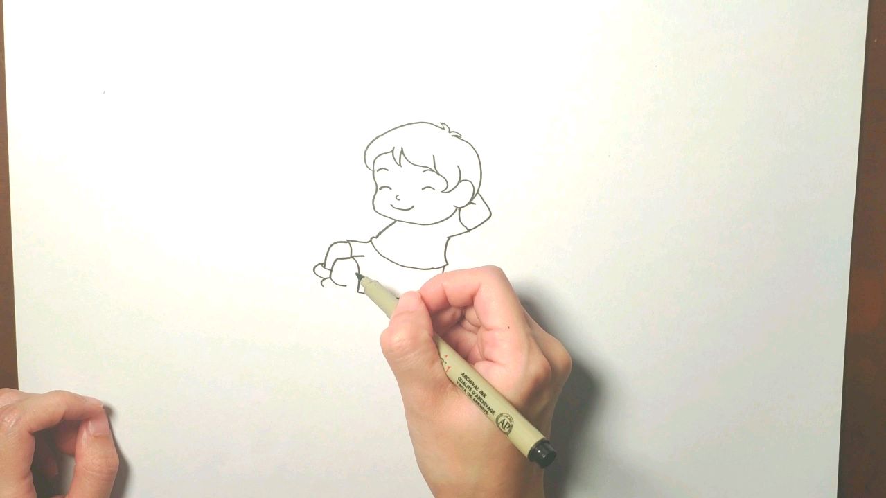 简笔画坐在月亮上的男孩