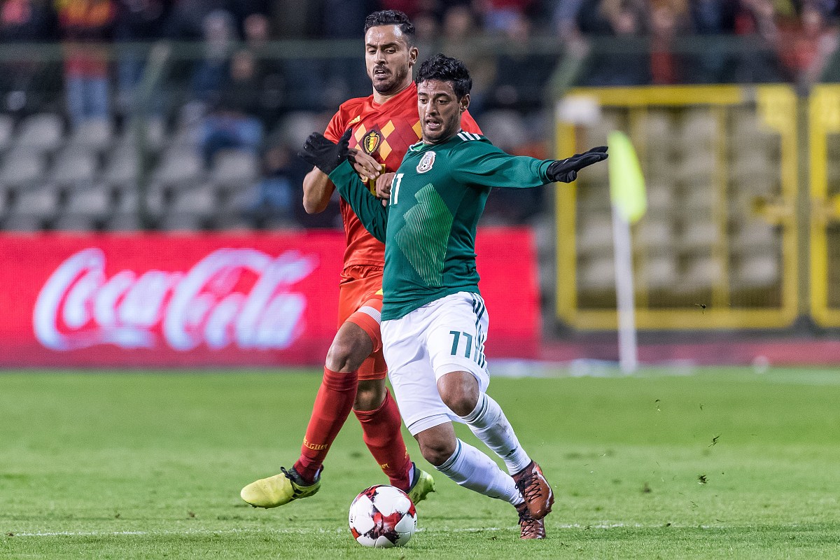 (l-<strong>r</strong>) nacer chadli of belgium, carlos vela of mexico during the