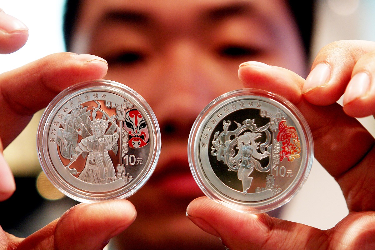 中国运动员在第几届奥运会拿到第一个金牌