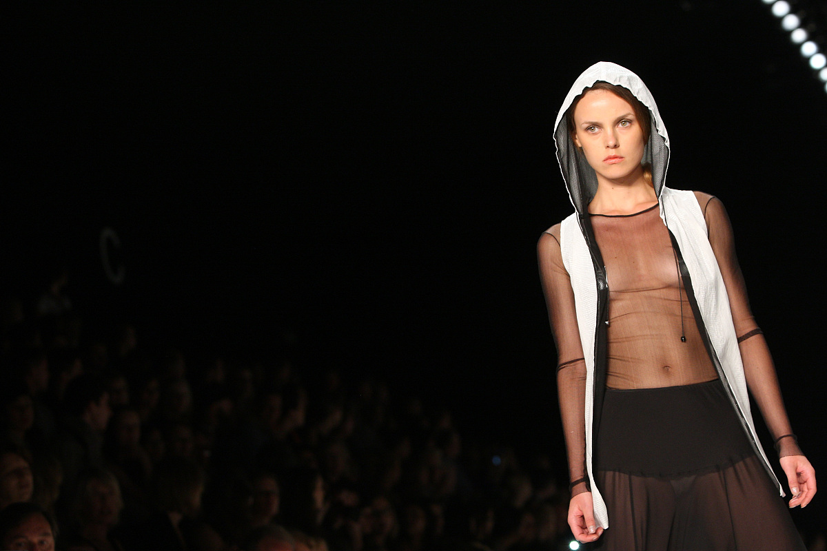 berlin, germany - july 07:  a model runs the catwalk during the 
