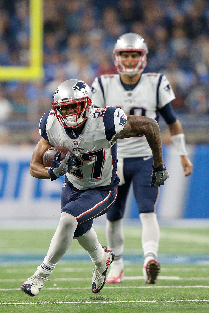 new england patriots running back d.j. foster (27) runs the ball