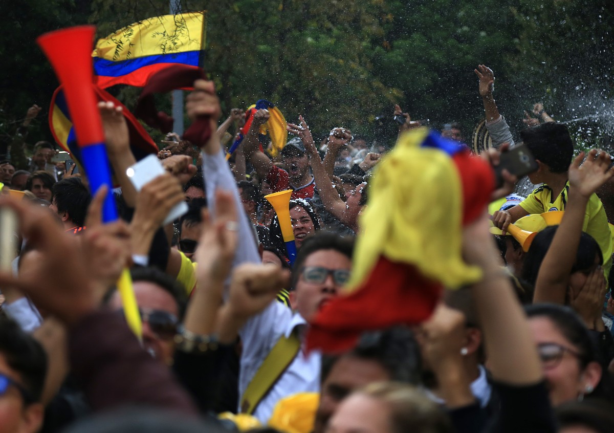 bogota, colombia - july 03: fans of colombia celebrate after a g