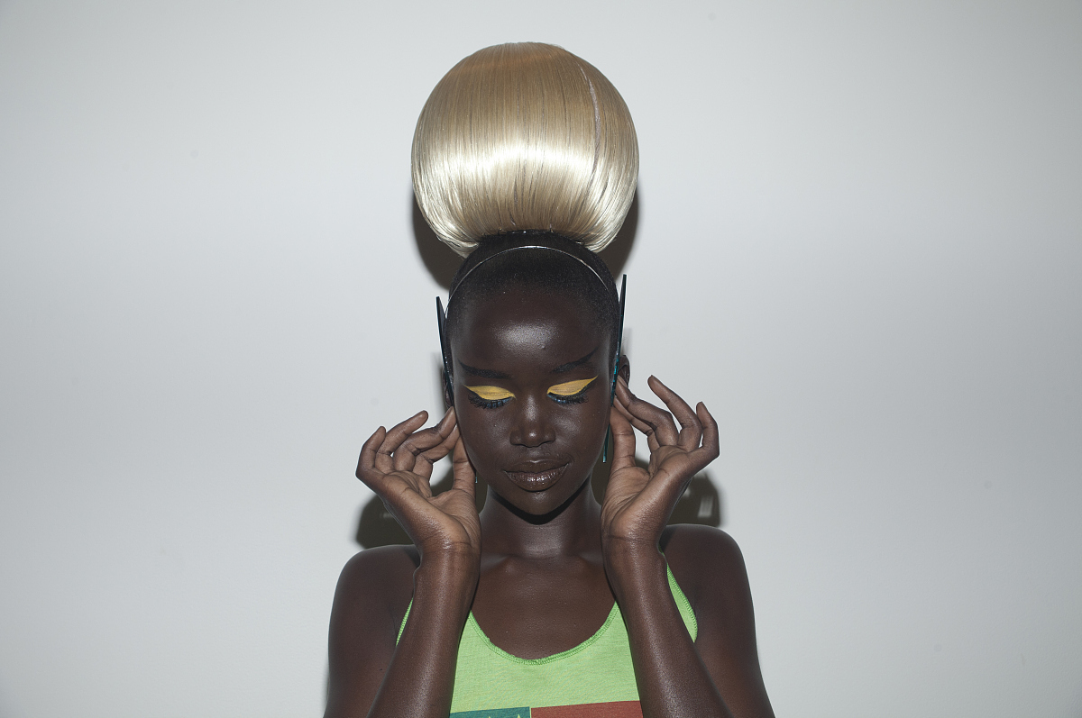 <strong>a</strong> model poses backstage at the blonds s/s 2014 fashion show at
