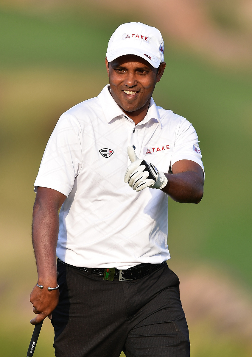 <strong>p</strong> chawrasia of india celebrates his win on the 18th hole during
