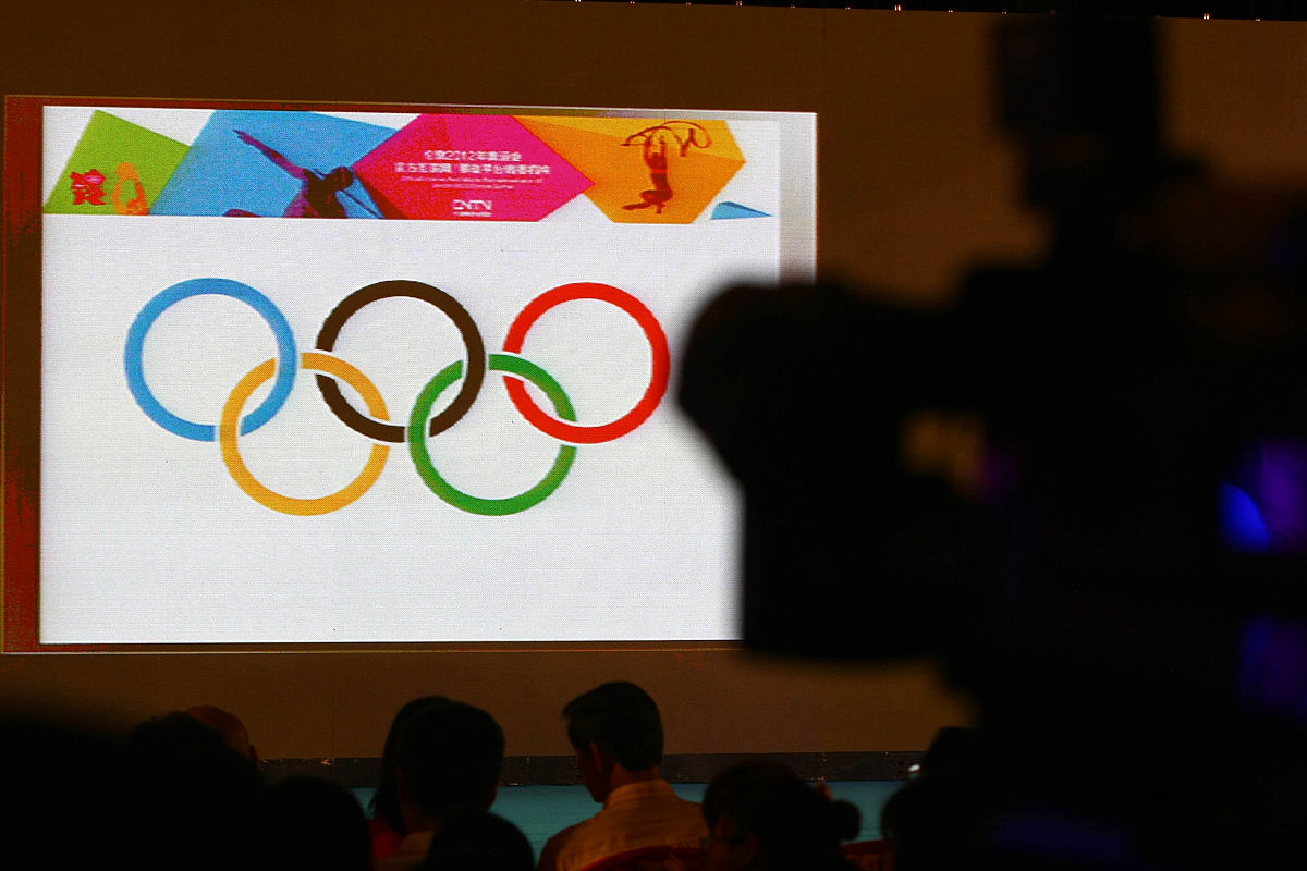 从上面那一段话转到北京的双奥精神