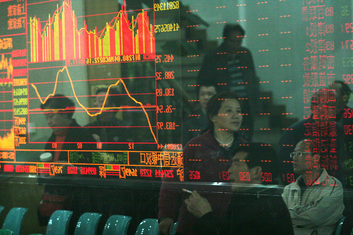 ***_***2009年3月27日,武汉汉口一家证券营业厅内,股民关注大盘走势.+
