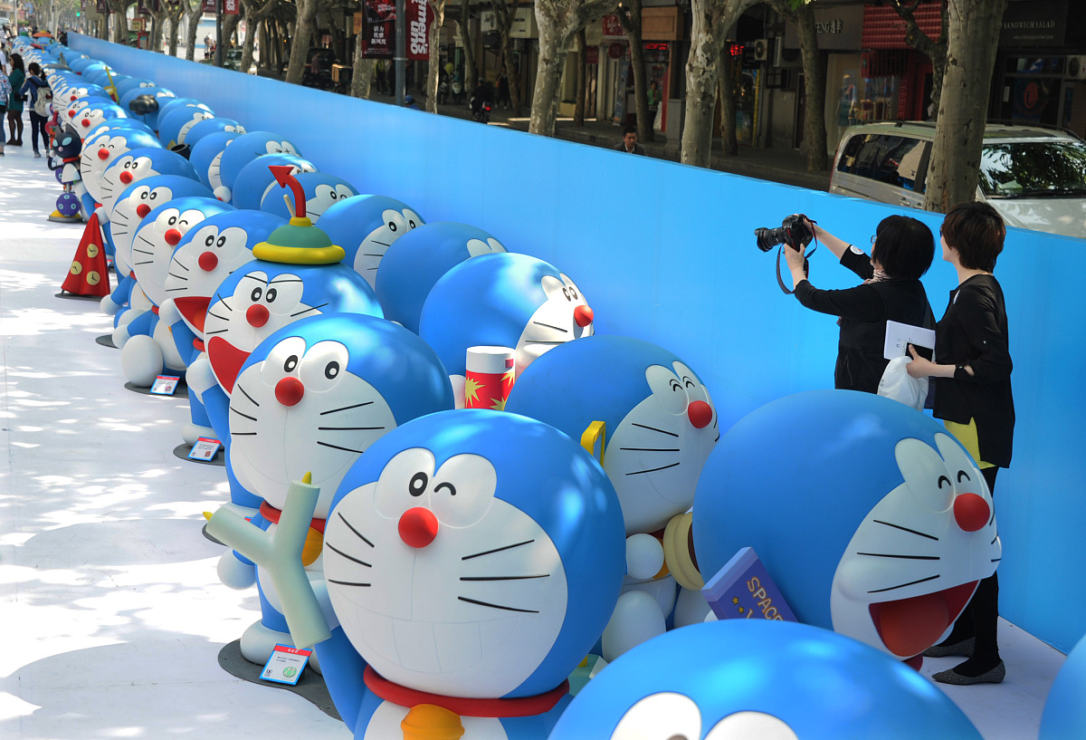 我需要你帮我生成ai绘画 机器猫的词汇合成一句并加逗号发给我