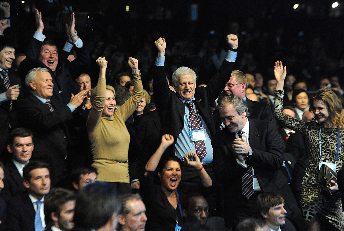 the russian delegation celebrate being named host nation of the 