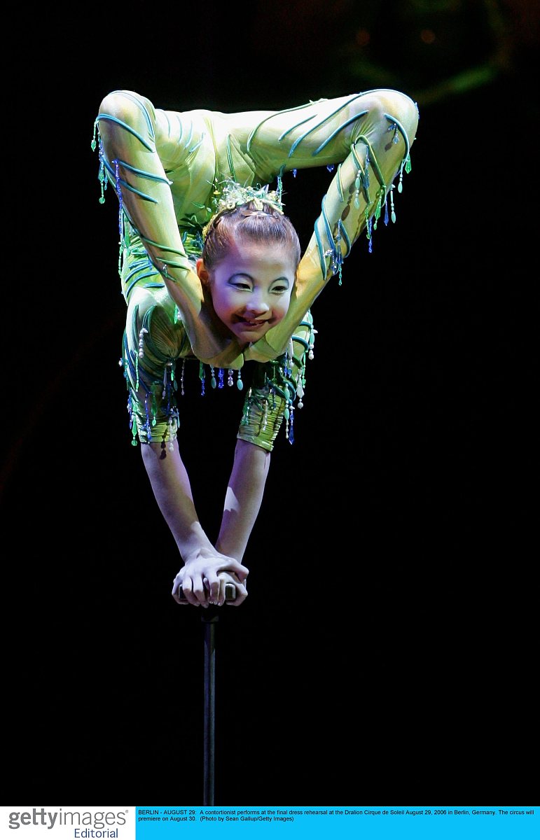 berlin - august 29:  a contortionist performs at the final dress