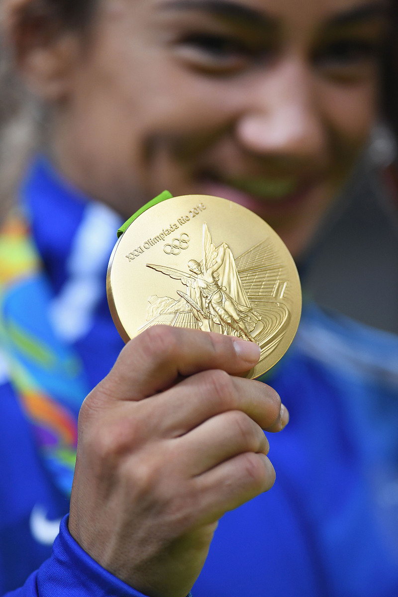 中国奥运金牌首获：第十三届奥运会