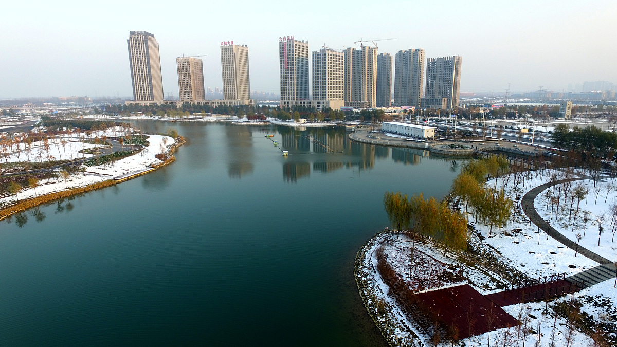 ***_***2016年11月23日,河南许昌,航拍雪后芙蓉湖银装素裹美景如画.