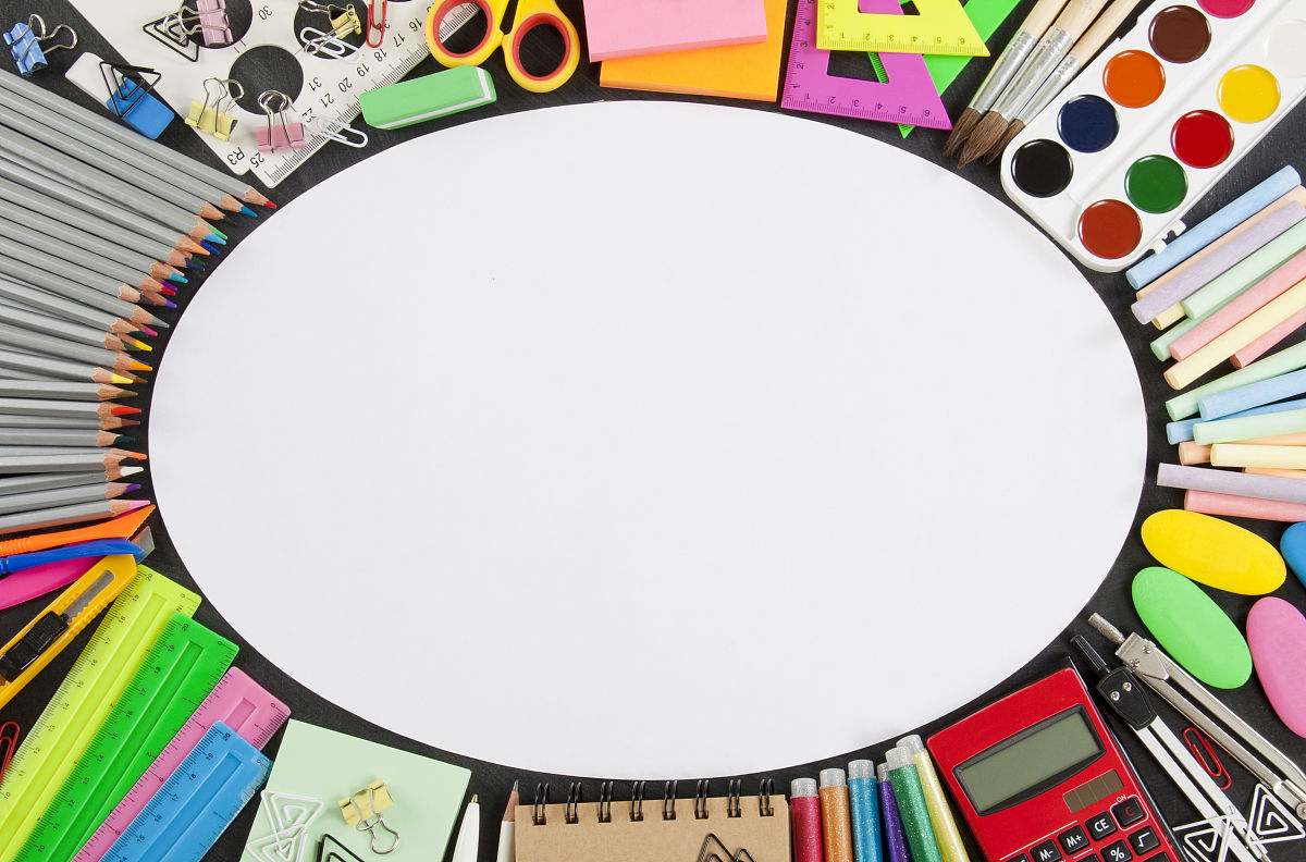 school supplies frame on a chalkboard background