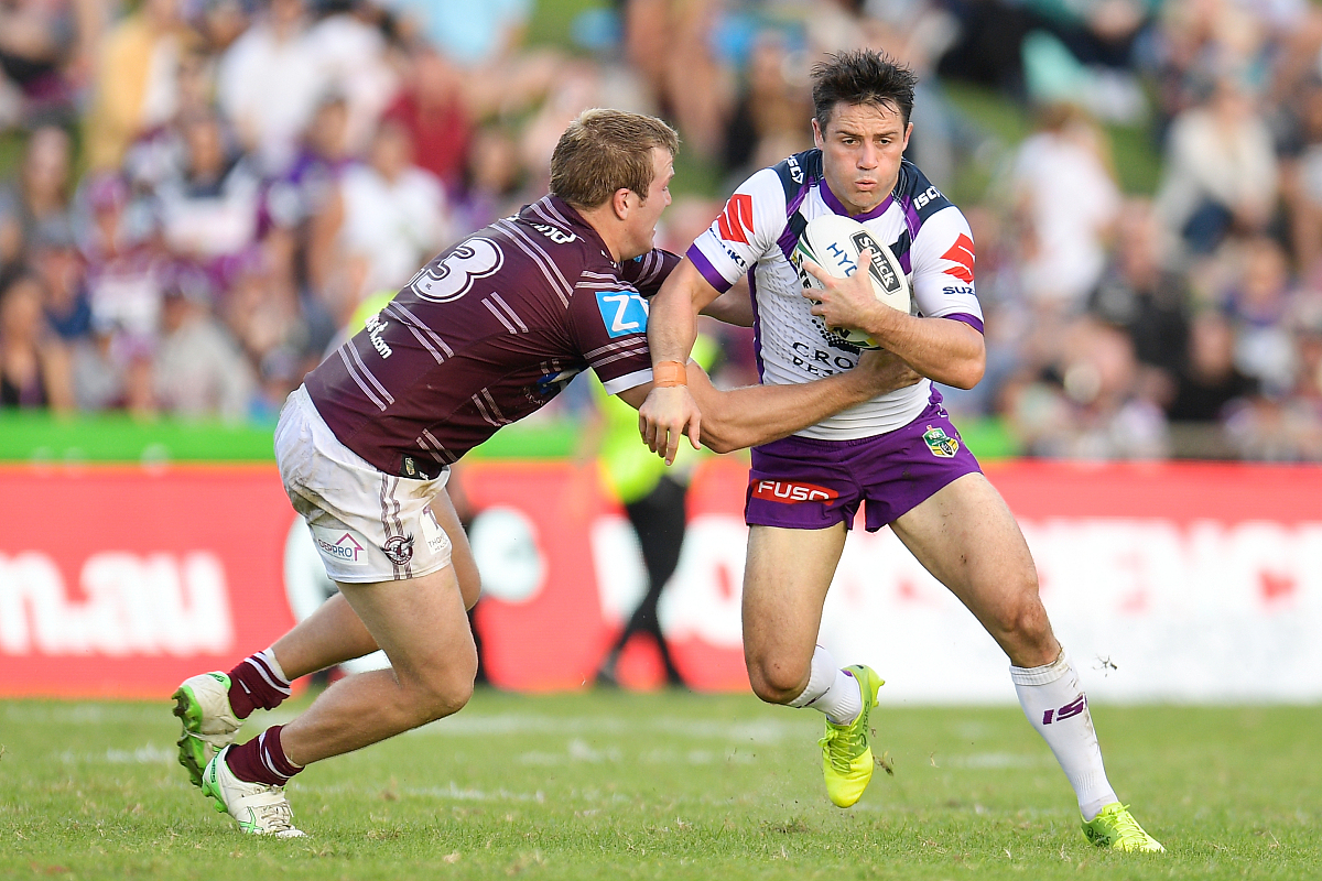 sydney, australia - april 15: cooper cronk of the storm is tackl