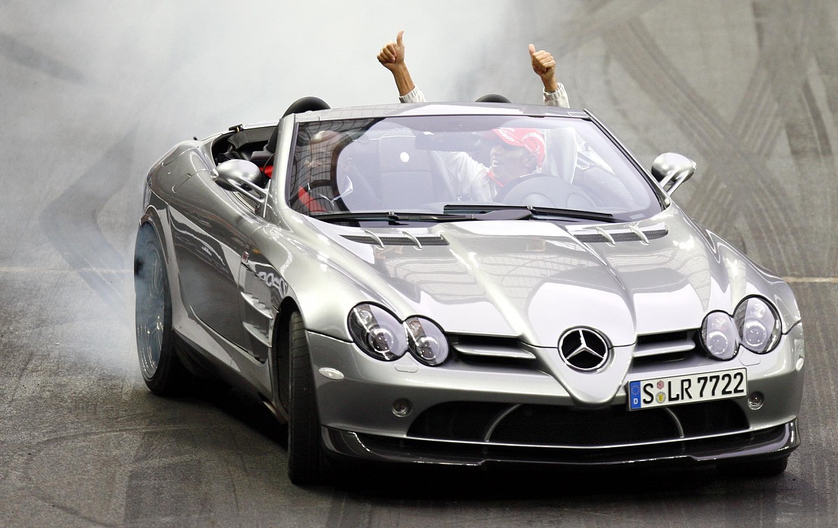 lewis hamilton drives his dad anthony round the track in a merce