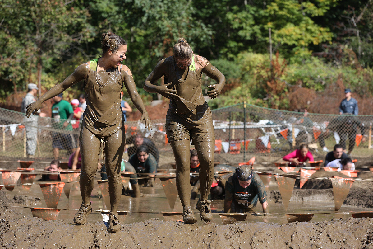 ***_***joyous competitors after tackling the mud pit during the 