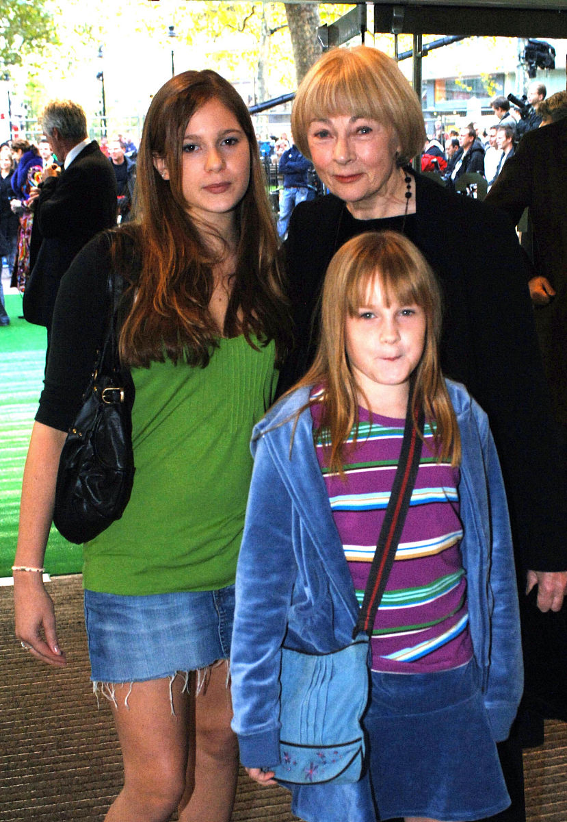 geraldine mcewan and her young companions arrive for the uk prem
