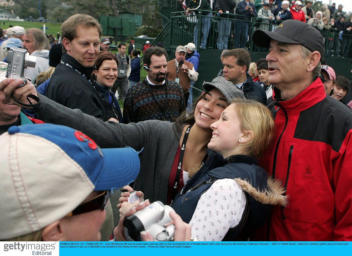 pebble beach, ca - february 07:  actor bill murray (r) has his p