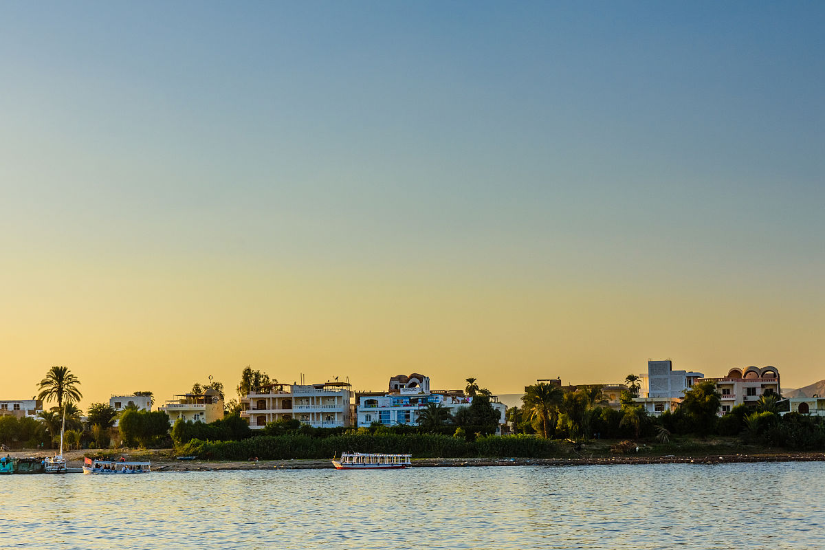 residential buildings on a bank of the nile river in luxor, egyp