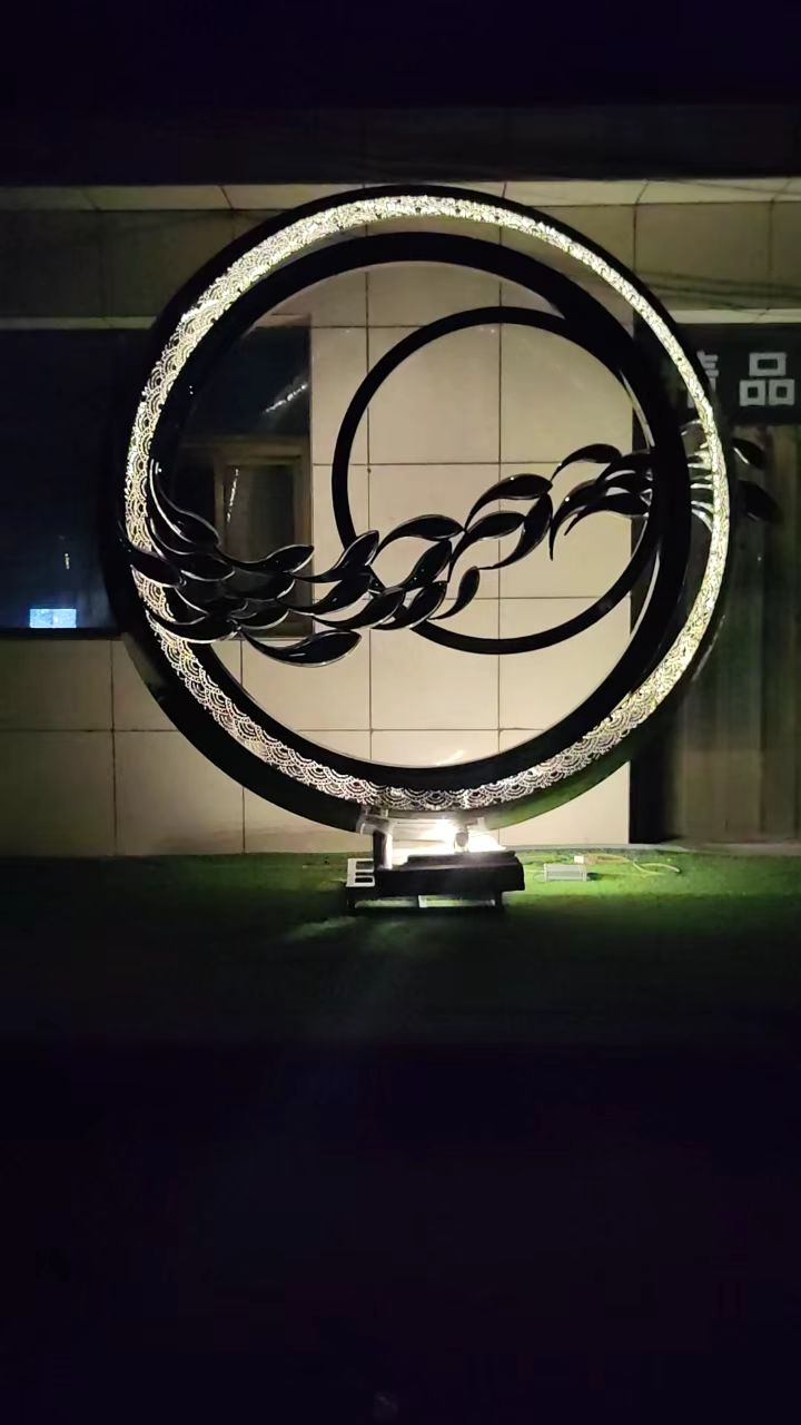 不锈钢灯光鱼群鱼跃龙门雕塑