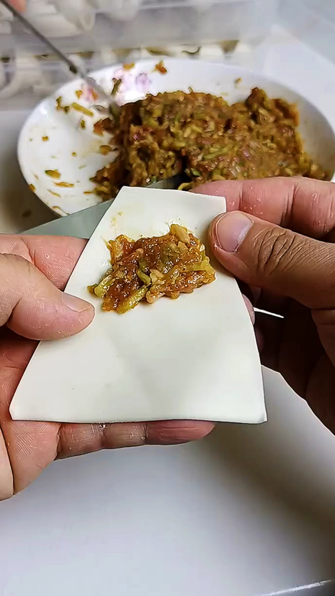 肉馅小馄饨包法