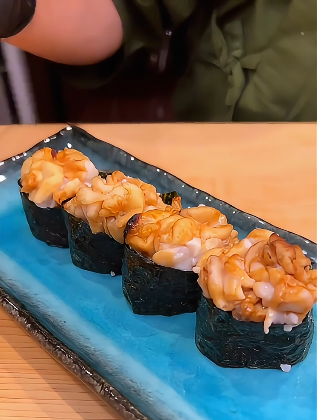 海洋的珍馐:揭秘烤鳕鱼白子军舰寿司的美味奥秘