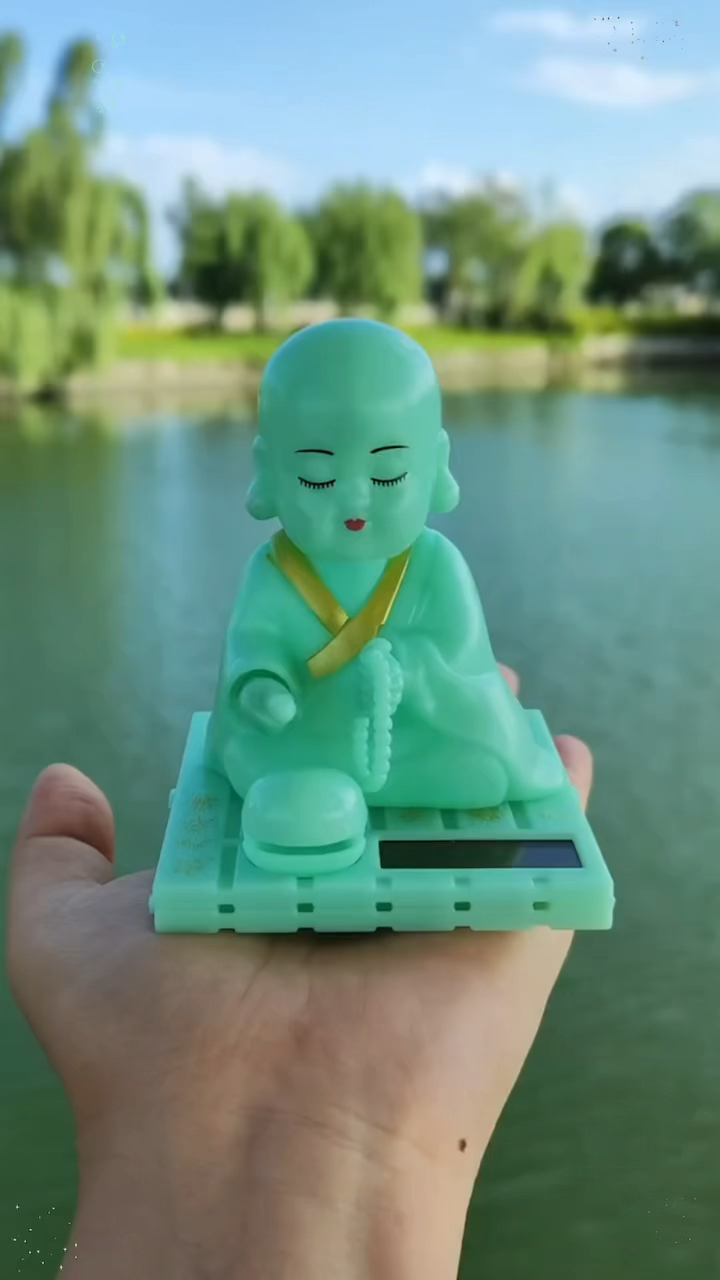 只要有阳光就会自己敲木鱼的小和尚