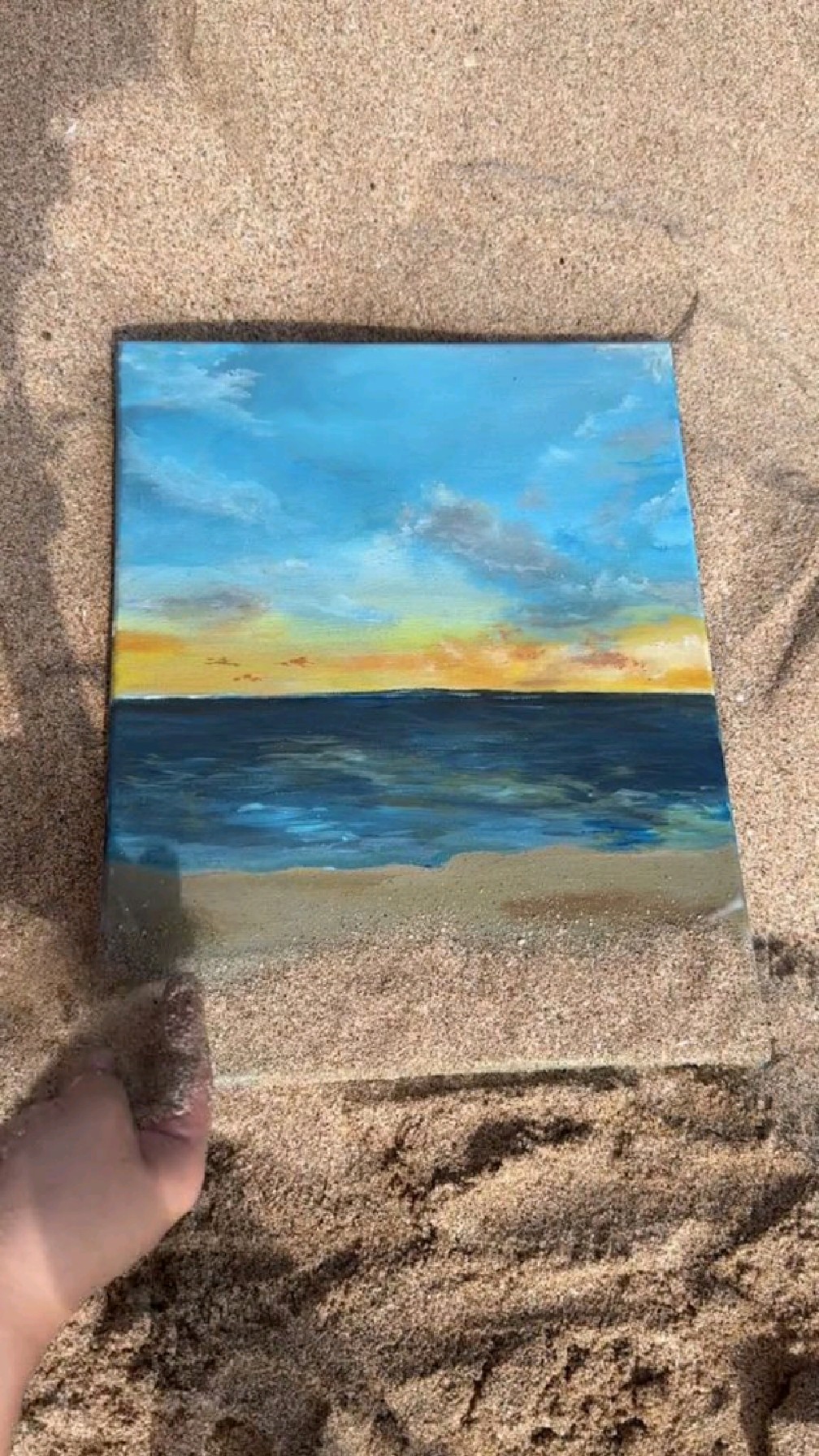 海边写生利用沙子画一幅海景油画