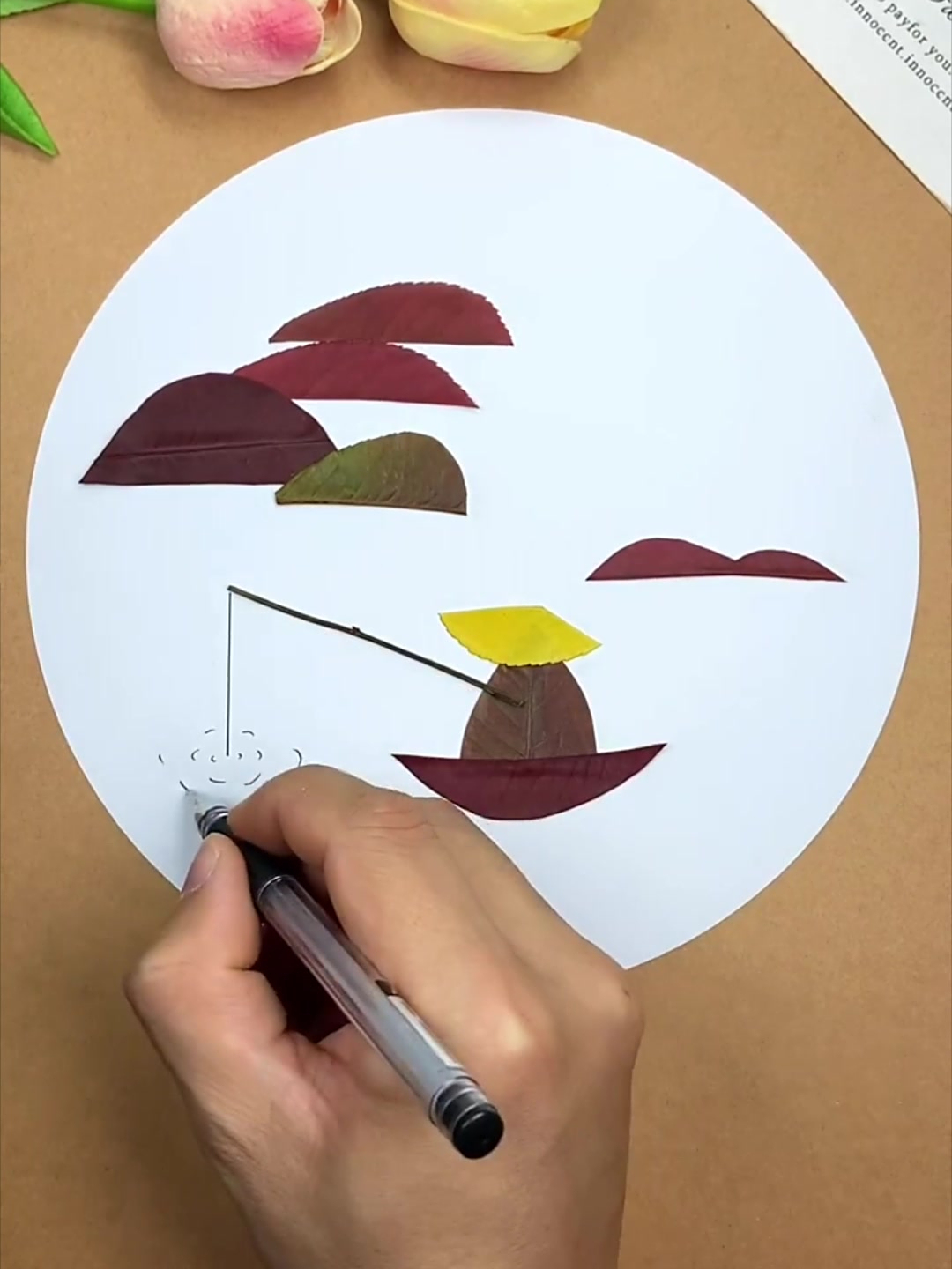 树叶制作的钓鱼的老翁