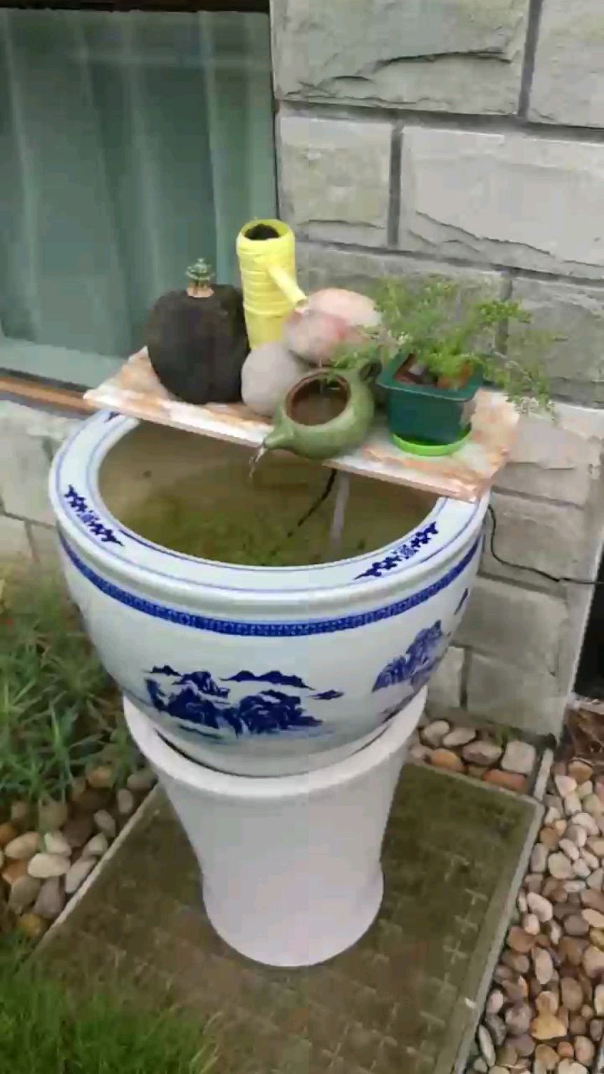 给鱼缸做了个流水景观
