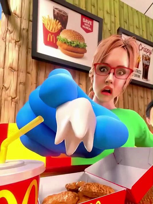 她在她的麦当劳炸鸡块里发现了一颗牙齿